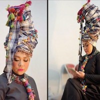 Melly Goeslaw pernah mengunggah foto penampilannya berhijab yang mendatangkan protes. Pada foto yang ditampilkannya di Instagram itu, Melly tampil memakai turban yang bentuknya memanjang ke atas. Gaya hijabnya yang unik tersebut dikritik oleh netizen dari Malaysia. Mereka menyebut apa yang dipakai pencipta lagu ternama itu bukanlah hijab dan mirip alien hingga unta. Melly pun memberikan komentarnya, Saya bukan wanita berhijab. Saya hanya wanita yang sangat bahagia menutup bagian-bagian tubuh saya yang sebaiknya ditutup dan belum memenuhi syarat-syarat seperti wanita berhijab. Foto: Instagram
