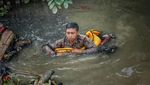 Foto: Kali Penuh Sampah yang Sulitkan Pencarian Jenazah Bocah Rohim