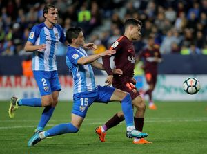Suarez dan Coutinho Menangkan Barca di Markas Malaga