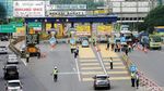 Foto: Suasana Saring Ganjil Genap di Pintu Tol Bekasi