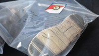 Salah satu barang bukti yang diamankan adalah sepatu milik Hari Darmawan (Foto: Dok. Humas Polres Bogor)
