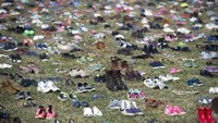 Aksi ribuan sepatu kosong ini mengingatkan akan monumen serupa di Danube, Hungaria (Foto: AFP PHOTO / SAUL LOEB)