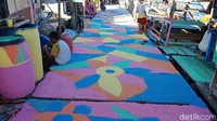 Ide pengecatan kampung nelayan ini menjadi warna-warni diapresiasi oleh Pemprov DKI Jakarta.