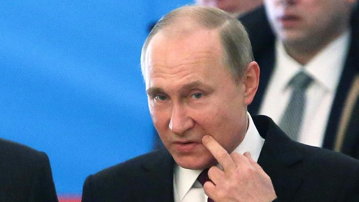 Russian President and Presidential candidate Vladimir Putin at a polling station during the presidential election in Moscow, Russia March 18, 2018. Sergei Chirkov/POOL via Reuters