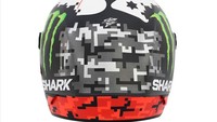 Secara keseluruhan, helm Lorenzo didesain dengan gambar pixel. Warna abu-abu dan merah pada helm dibuat pixel seperti gambar komputer jadul yang kotak-kotak.  Foto: Instagram/jorgelorenzo99