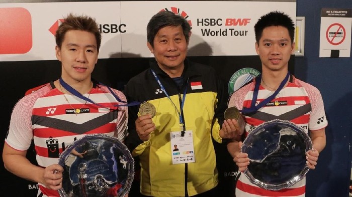 Kevin Sanjaya Sukamuljo/Marcus Fernaldi Gideon dan pelatih ganda putra PBSI Herry Iman Pierngadi