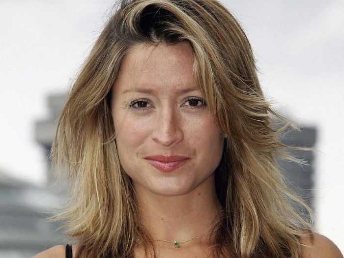LONDON - AUGUST 17:  Rebecca Loos launches Bladerun at Tower Bridge on August 17, 2006 in London, England. Bladerun is a 300-mile powerboat rally, which has been called the Gumball 3000 on water. The rally starts in the UK and travels down the coast of France, finishing back in UK at Poole Harbour.  (Photo by Gareth Cattermole/Getty Images)