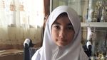 Foto: Ekspresi Bulan saat Coba Kursi Roda dari Jokowi