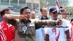 Gaya Imam Nahrawi Memanah