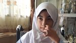 Foto: Ekspresi Bulan saat Coba Kursi Roda dari Jokowi