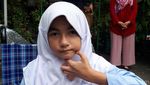 Foto: Ekspresi Bulan saat Coba Kursi Roda dari Jokowi