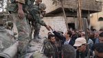 Foto: Nyetir Sendiri, Assad Menyusuri Jalanan Ghouta Timur