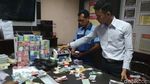 Uang Mainan dan Dolar AS Plastik yang Disetor Mujiono ke Bank