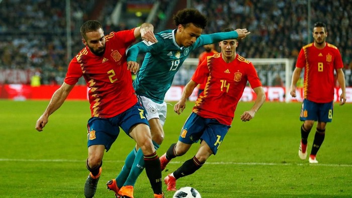 Soccer Football - International Friendly - Germany vs Spain - ESPRIT arena, Dusseldorf, Germany - March 23, 2018   Germany’s Leroy Sane in action with Spain’s Dani Carvajal and Lucas Vazquez       REUTERS/Thilo Schmuelgen