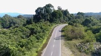 Kini, jalan perbatasan Indonesia-Malaysia di Kalimantan sudah mulus dan lincin.Foto: Dok.Facebook Presiden Jokowi/Instagram PUPR