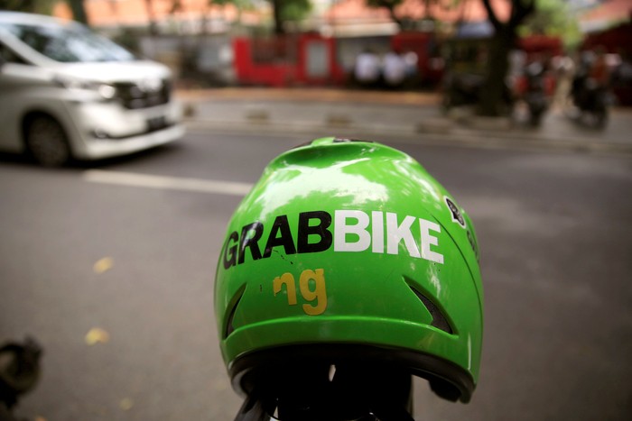 Ilustrasi Grab Bike. Foto: Dok. Reuters/Beawiharta Ilustrasi Grab Bike. Foto: Dok. Reuters/Beawiharta