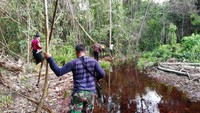 Lokasi tersebut berada di tengah hutan dengan medan sangat sulit.