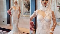 Kue ini bernama Lulwa atau Million Dollar Bride, kue pernikahan seberat 120 kilogram yang sengaja dibuat Debbie berbentuk seperti wanita berhijab dengan riasan cantik khas mempelai Arab. Kue pernikahan ini dibanderol sebesar Rp 913 miliar! Foto: Instagram @debbie_wingham