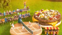 Apa jadinya kalau foto burger yang dikreasikan? Inilah McDouble yang diibaratkan sebagai lapangan tennis. Nampak ada pemain tenis, penonton dan orang-orang di sekitar taman. Foto: Instagram mcdonaldsau