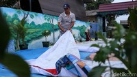 Dipilihnya nuansa air terjun karena warganya senang mancing.