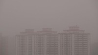 Debu mengepung Beijing, China hari ini. Kualitas udara pun masuk dalam kategori sangat tidak sehat (Foto: REUTERS/Jason Lee)