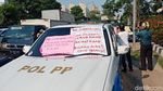 Nasib Mobil Satpol PP yang Ditempeli Poster Penolakan di Alexis
