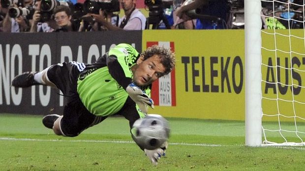 FILES - Picture taken on June 29, 2008 shows German goalkeeper Jens Lehmann diving to make a save during the Euro 2008 championships final football match Germany vs. Spain in Vienna, Austria. Lehmann announced on August 18, 2009 at German 's television channel