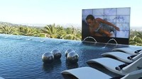 Kolam renang di rumah ini punya pemandangan ke Los Angeles. Tidak hanya itu, ada layar berukuran 210 inci yang bisa dikeluarkan kapan saja. Foto: BAM Luxury Development.