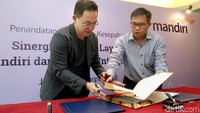 Melalui kerjasama ini, nasabah Bank Mandiri dan pengguna OVO dapat melakukan transaksi di jaringan merchant yang telah bekerjasama dengan Bank Mandiri maupun OVO. Foto: Dok.Bank Mandiri