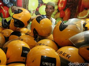 Grab Mulai Rekrut Ribuan Pengemudi Uber