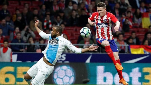 Kevin Gameiro (kanan) sukses mengeksekusi penalti dan membawa Atletico Madrid menang 1-0 atas Deportivo La Coruna. (