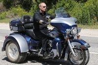 Vladimir Putin naik motor roda tiga