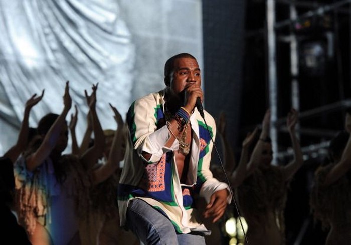 Kanye West INDIO, CA - APRIL 17: Rapper Kanye West performs during Day 3 of the Coachella Valley Music & Arts Festival 2011 held at the Empire Polo Club on April 17, 2011 in Indio, California. (Photo by Kevin Winter/Getty Images)
