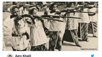 Kemarahan klaim rendang ayam harus renyah juga dirasakan warga Indonesia dan Singapura. Azry Khalil menanggapi klaim itu dengan mengunggah foto wanita berkain batik sedang memegang senjata. Wah, mungkin masalah ini amat serius ya baginya. Foto: Twitter @zulazry