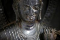 Patung Buddha yang diperkirakan berusia 700 tahun