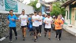Foto: Aksi Sandiaga Lari 5 Kilometer Susuri Ciliwung