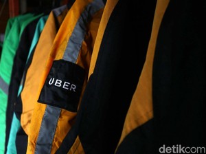 Mundurnya Uber Bikin Grab Kuasai Indonesia