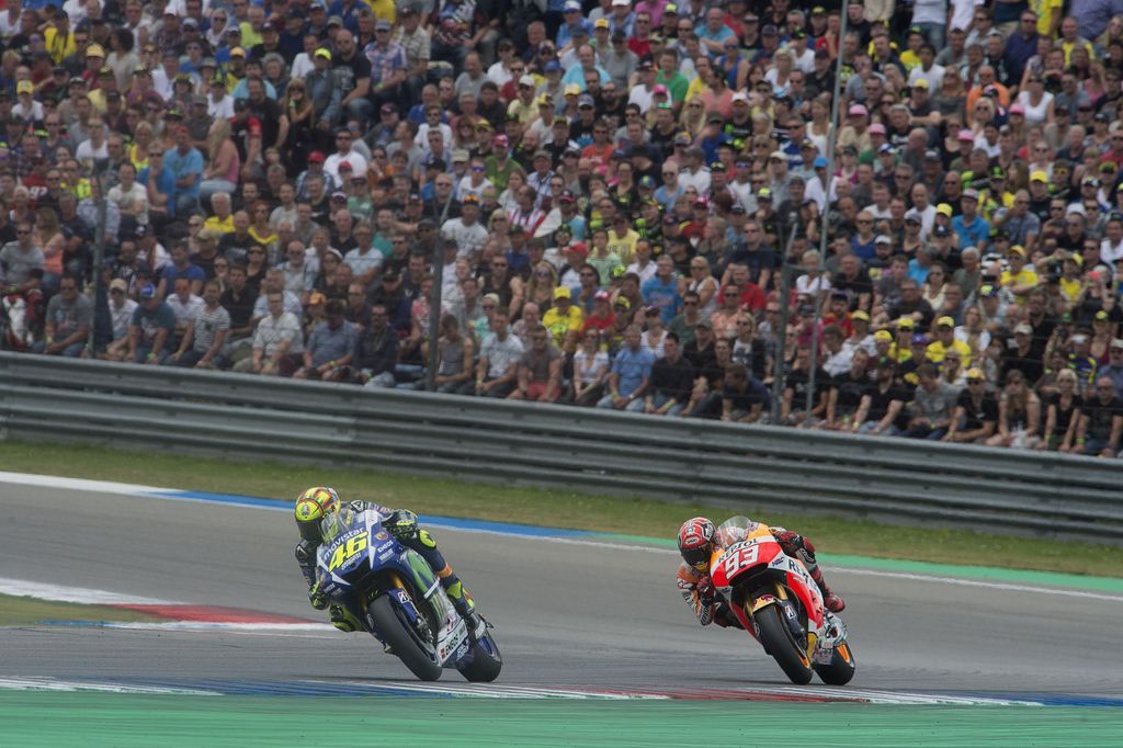 ASSEN, NETHERLANDS - JUNE 27:  Valentino Rossi of Italy and Movistar Yamaha MotoGP leads Marc Marquez of Spain and Repsol Honda Team during the MotoGP race during the MotoGP Netherlands - Race at  on June 27, 2015 in Assen, Netherlands.  (Photo by Mirco Lazzari gp/Getty Images)