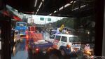 Penampakan TransJakarta Terguling di Depan UKI