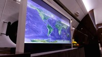 Pesawat senilai US$ 25 juta (Rp 330 miliar) ini sekarang dilengkapi televisi 42 inci lengkap dengan trading desk bermonitor ganda senilai US$ 85.000 (Rp 1,15 miliar).