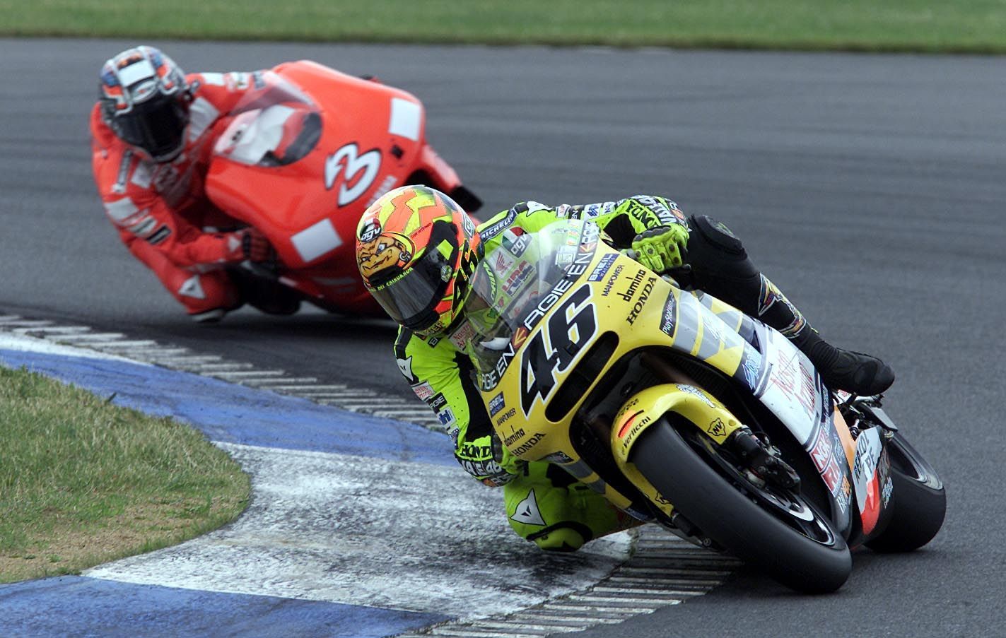 8 Jul 2001: Valentino Rossi of Italy and Honda in action leading Max Biaggi of Italy and Yamaha during the British Motorcycle Grand Prix at Donington Park, Derbyshire. XX DIGITAL IMAGE XX Mandatory Credit: Clive Mason/ALLSPORT