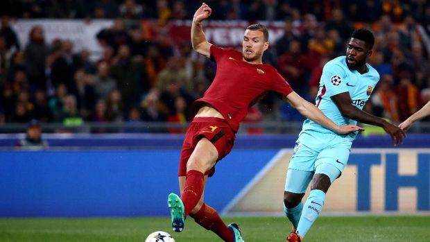 Edin Dzeko membuka keunggulan AS Roma atas Barcelona.