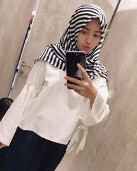 Dena Eks JKT48 Berhijab, Ini Gayanya yang Bisa Jadi Inspirasi Remaja
