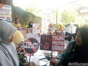 Jerat Politik Uang