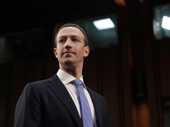 WASHINGTON, DC - APRIL 10:  Facebook co-founder, Chairman and CEO Mark Zuckerberg departs after testifying before a combined Senate Judiciary and Commerce committee hearing in the Hart Senate Office Building on Capitol Hill April 10, 2018 in Washington, DC. Zuckerberg, 33, was called to testify after it was reported that 87 million Facebook users had their personal information harvested by Cambridge Analytica, a British political consulting firm linked to the Trump campaign.  (Photo by Win McNamee/Getty Images)