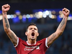 Dejan Lovren tampil memukau bersama Liverpool dan Timnas Kroasia sehingga masuk kandidat tim terbaik FIFA 2018. Penilaian itu diberikan untuk performa pada periode 3 Juli 2017-15 Juli 2018 (Laurence Griffiths/Getty Images)