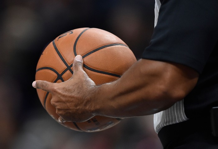 SALT LAKE CITY, UT - OCTOBER 2: General view of a NBA referee holding a game ball at Vivint Smart Home Arena on October 2, 2017 in Salt Lake City, Utah. NOTE TO USER: User expressly acknowledges and agrees that, by downloading and or using this photograph, User is consenting to the terms and conditions of the Getty Images License Agreement. (Photo by Gene Sweeney Jr./Getty Images) *** Local Caption ***
