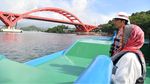 Foto: Potret Mesra Jokowi-Iriana Sepayung Berdua di Jayapura
