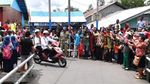 Hujan-hujanan, Jokowi Cek Infrastruktur di Asmat