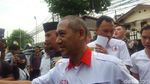 Foto: Gaya Ahmad Dhani Berkaus #2019GantiPresiden ke Sidang